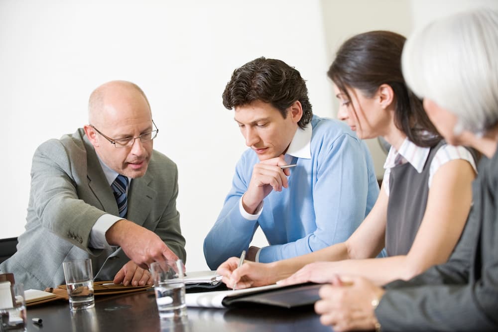 A team discussing their sales strategy for Q4.